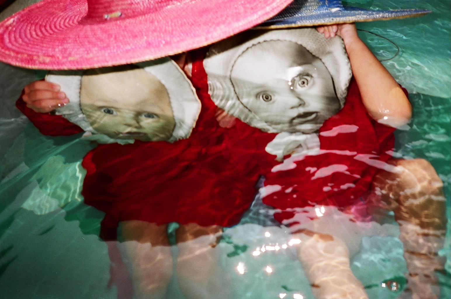 Link to Image of Twins Underwater